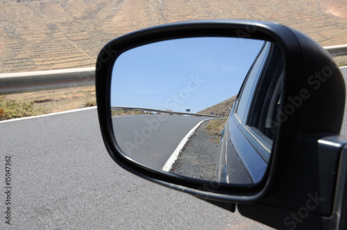 Road in rear view mirror, Fuerteventura Spain