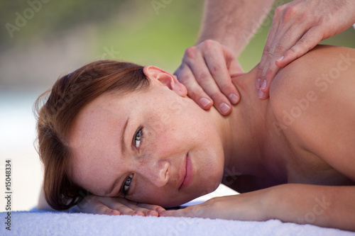 pretty woman enjoying neck massage