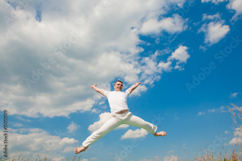 Happy young man - jumping
