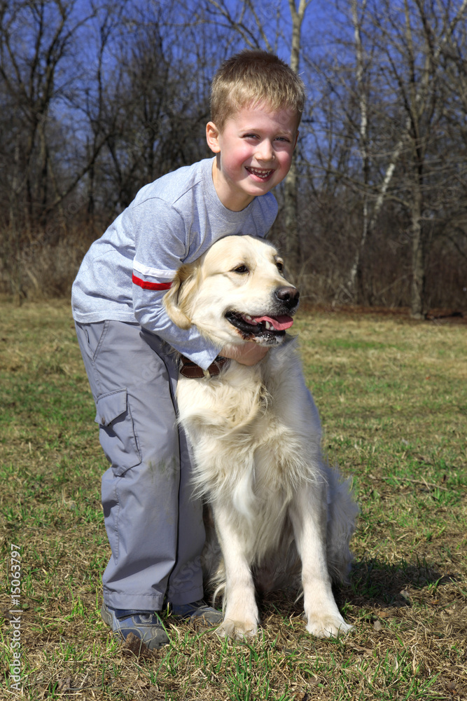 friends - little boy with big retriever outdoors friends - little boy with big retriever outdoors