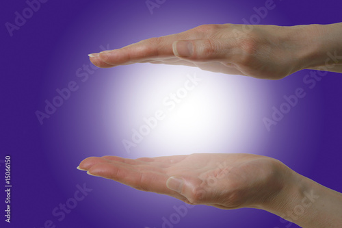 Parallel hands and healing energy photo