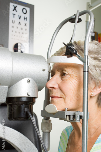 Lady having eye test examination