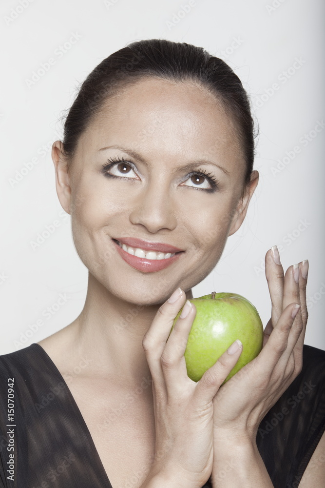 woman holding apple woman holding apple