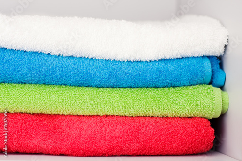 Colorful towels in the closet