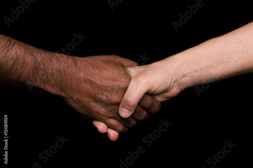 Hands white woman and a black man