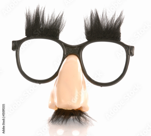 silly groucho marx style glasses isolated on white