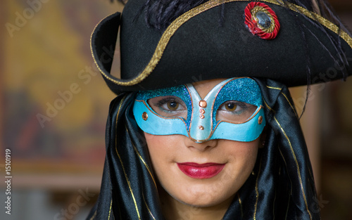 woman wearing carnival mask