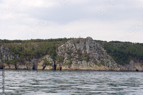 grotto in the rock, view by sea