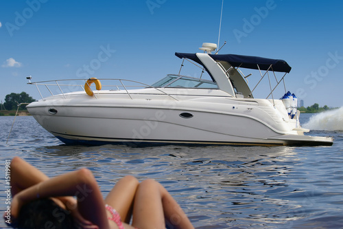 Luxury boat and young woman