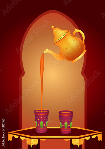 Arabic Tea: Arabic teapot and golden glasses.