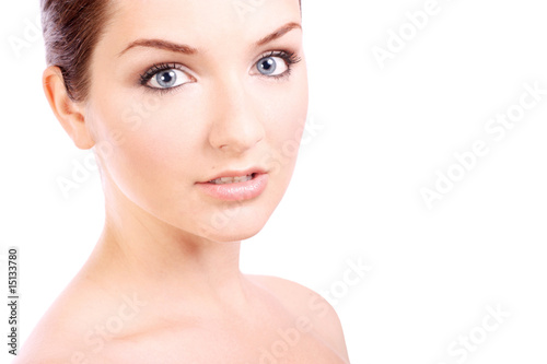 Beautiful young woman looking at camera