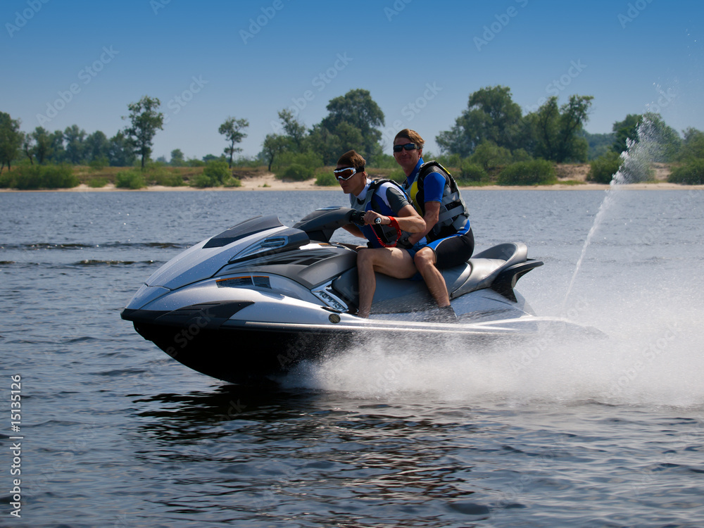 Fototapeta premium Couple men on jet ski in the river