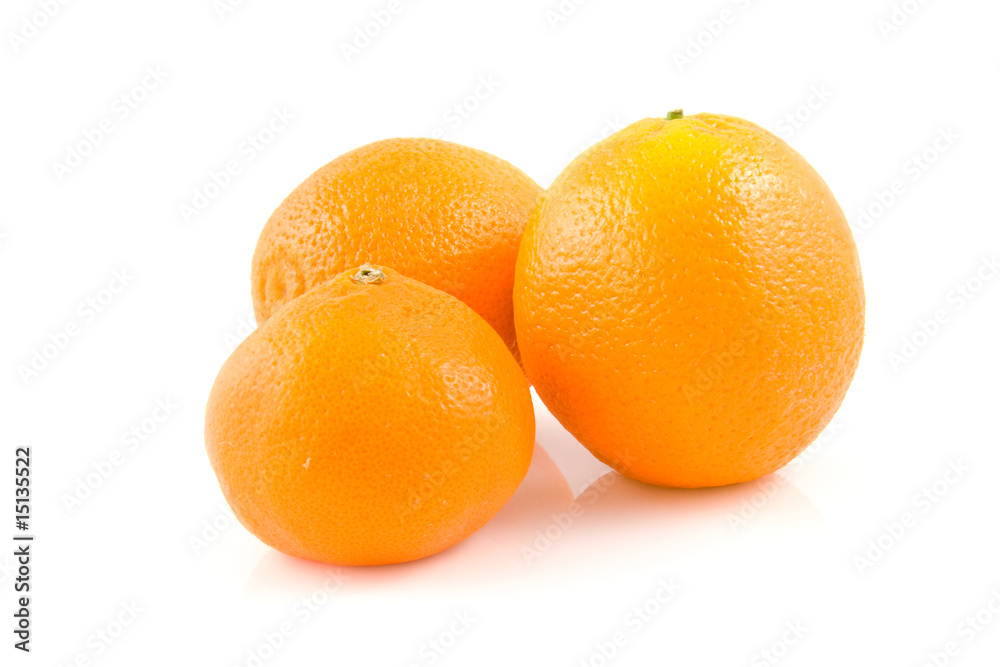 Two oranges and one mandarin on white backgound Two oranges and one mandarin on white backgound