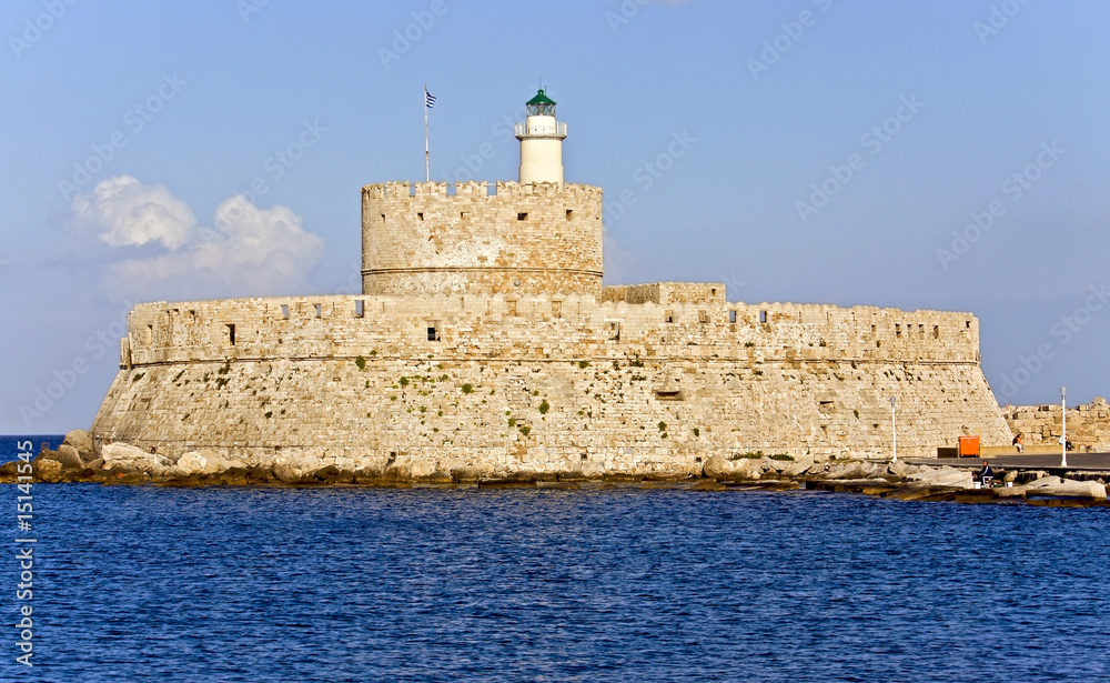 Castle with a lighthouse at Rhodes in Greece