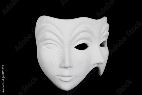 Double face white mask isolated over black