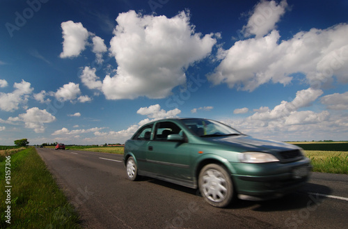 Road, car, blue cloudy sky © Zsolt Biczó