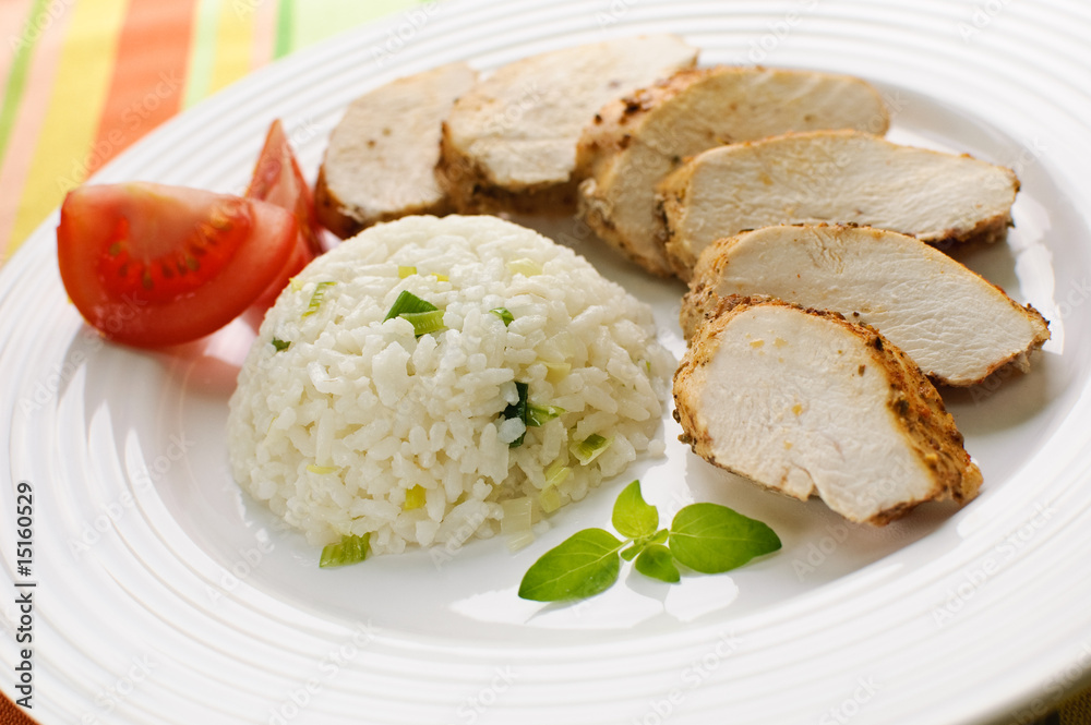 Roasted chicken meat with white rice and vegetables Roasted chicken meat with white rice and vegetables