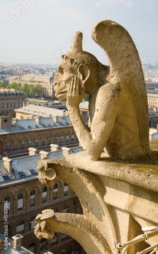 Closeup of gargoyle on the top of Notre-Dame de Paris