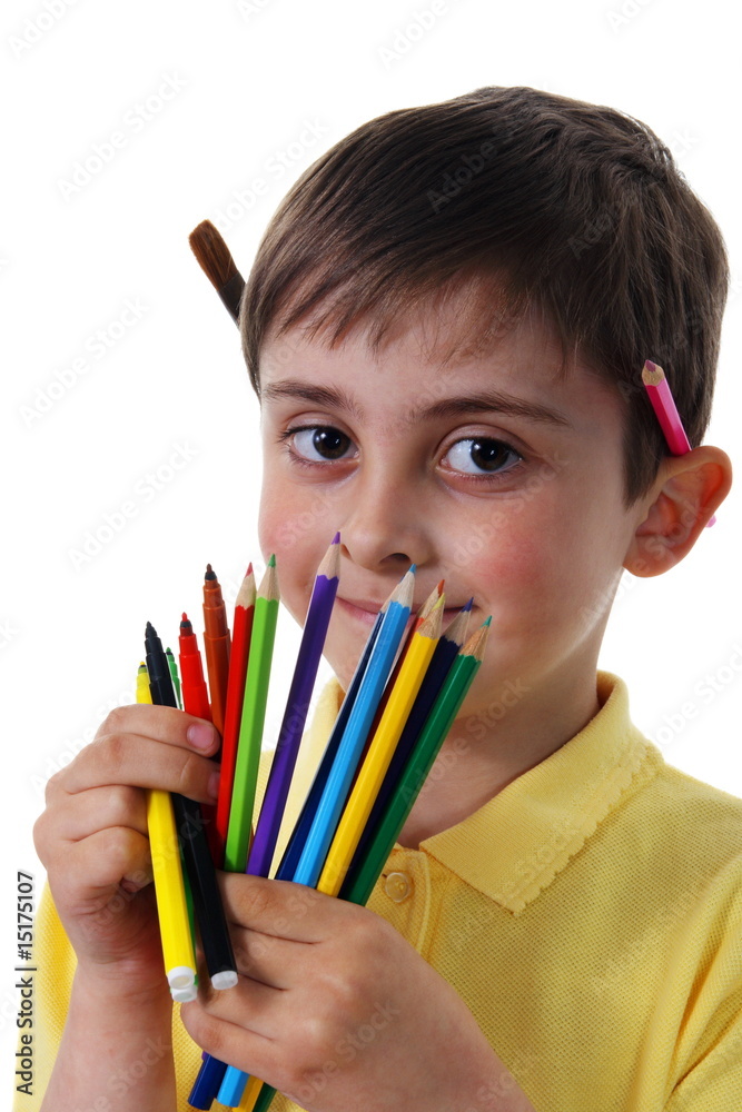 Little boy with crayons on a white background Little boy with crayons on a white background