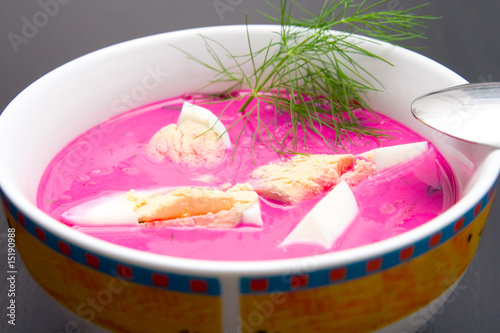 polish beet soup served cold with boiled egg photo