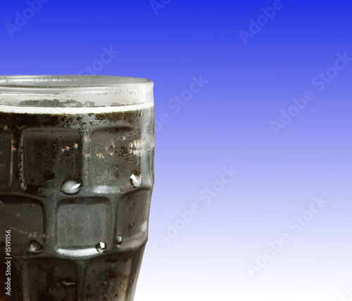 Ice Cold Cola over blue background