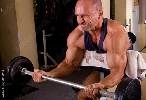 Bodybuilder training his bicep