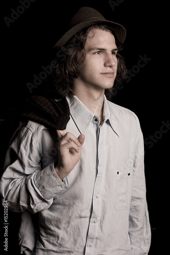 teen in suit with hat photo