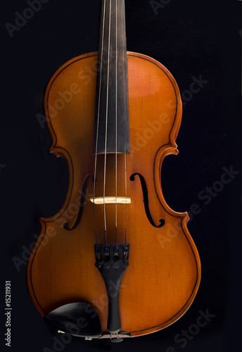 Beautiful antique violin over black