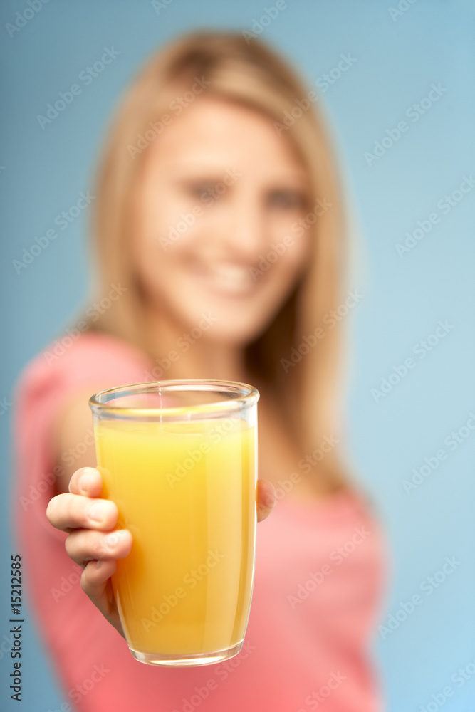 Teenage Girl Holding Glass Of Juice Teenage Girl Holding Glass Of Juice