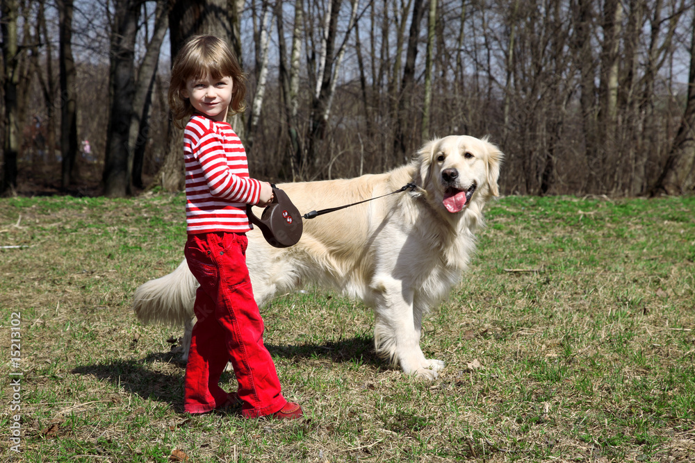 friends - little girl with big retriever outdoors friends - little girl with big retriever outdoors