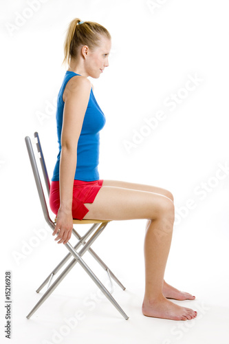 exercising woman sitting on chair