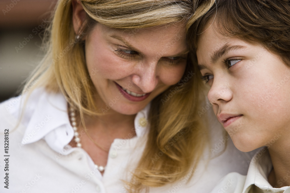 Closeup mother and son gazing at one another