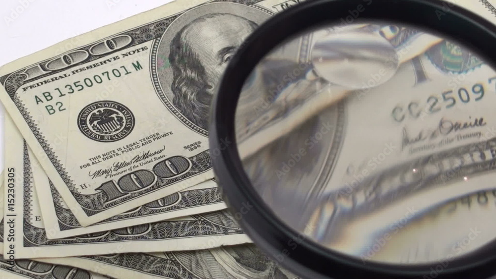 Magnifying stack of hundred dollar bills - HD Magnifying stack of hundred dollar bills - HD