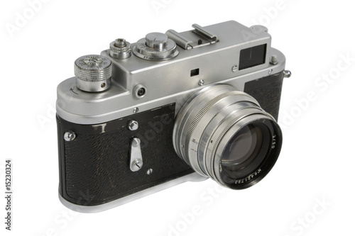 A classic manual film camera, on white.