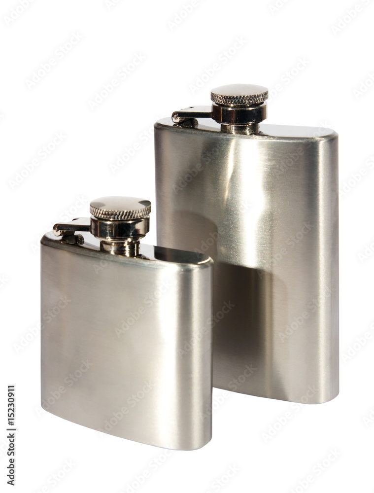 Two metallic flasks on a white background. (isolated) Two metallic flasks on a white background. (isolated)