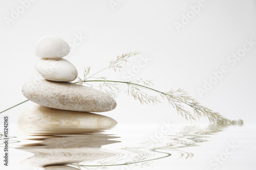 Canvas Print wellness still life, pebbles stacked with blade of grass