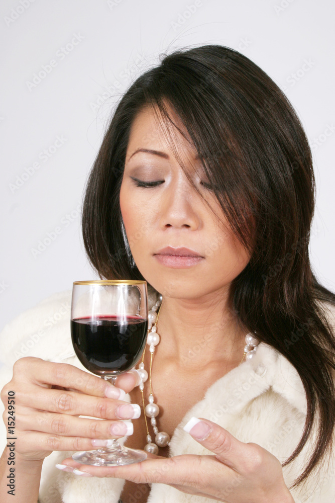 Enjoying a glass of red wine Enjoying a glass of red wine