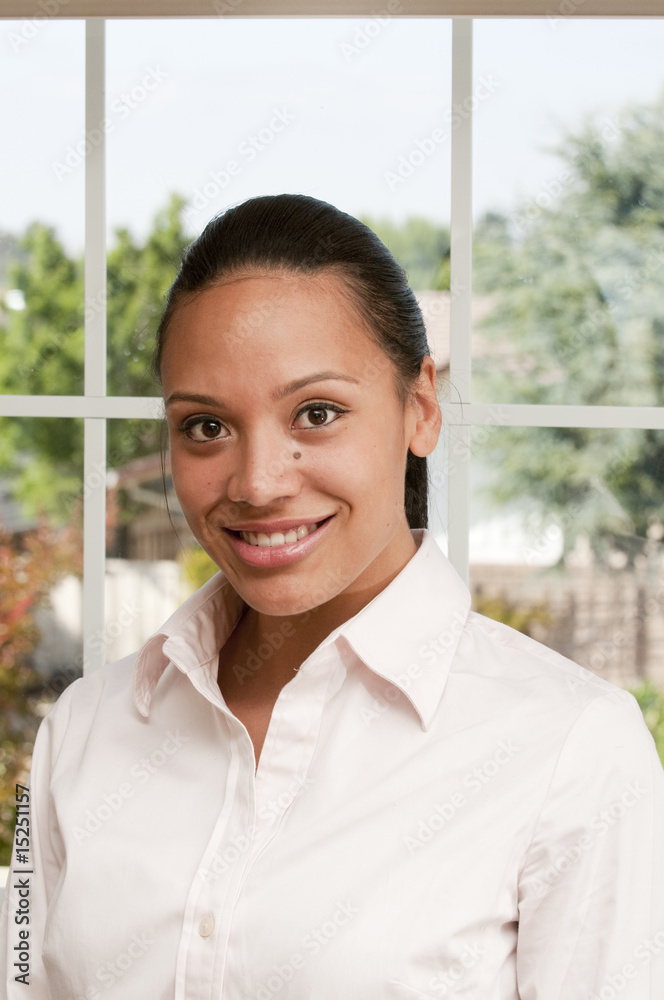 Beautiful young african american woman smiling