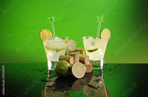 Caipirinha, whiskey sour or pisco sour with sugar cane and lime