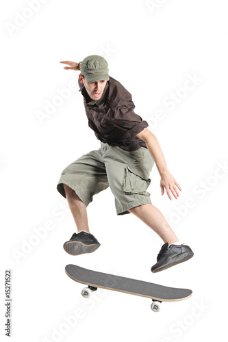 A skateboarder jumping isolated on a white background