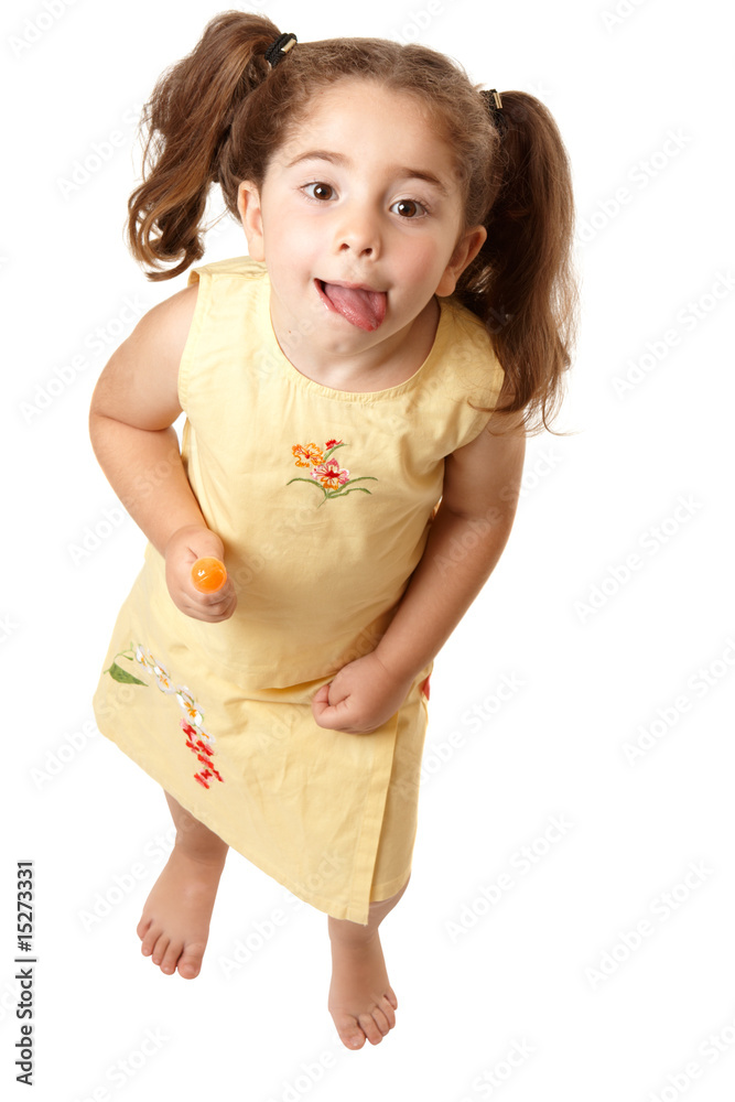 Funny adorable girl looking up and licking lips Funny adorable girl looking up and licking lips