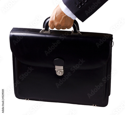 Man's hand holding briefcase