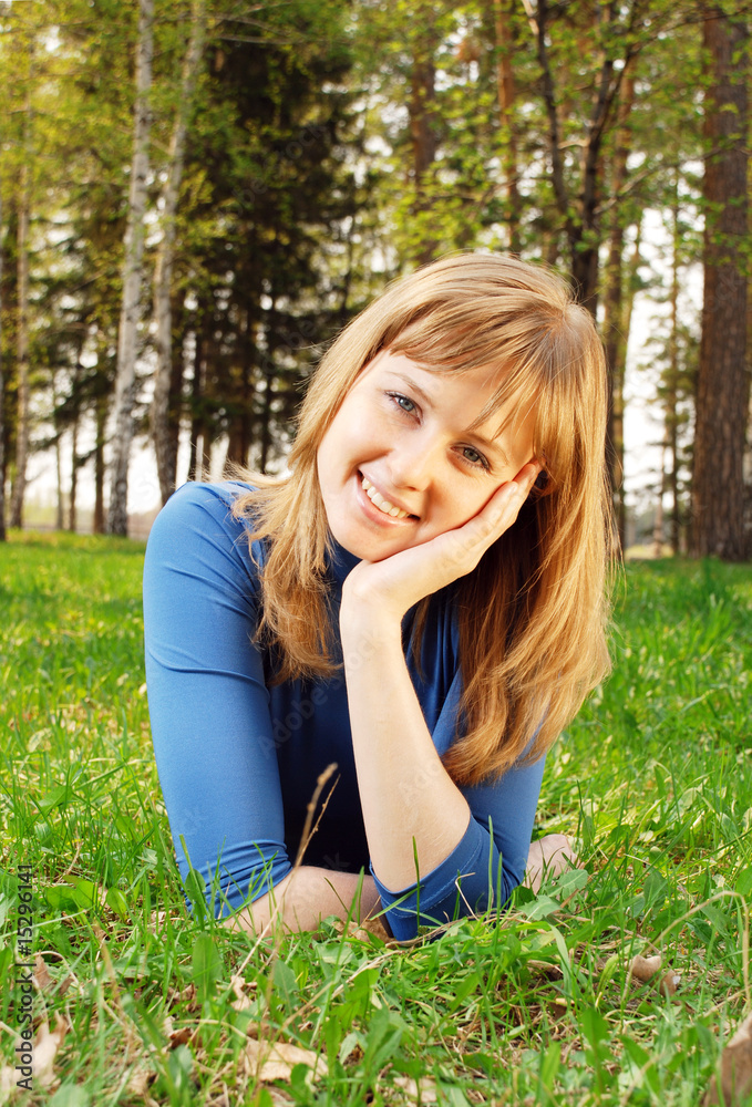 The young girl on a grass The young girl on a grass