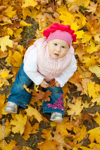 Girl in yellow leaves