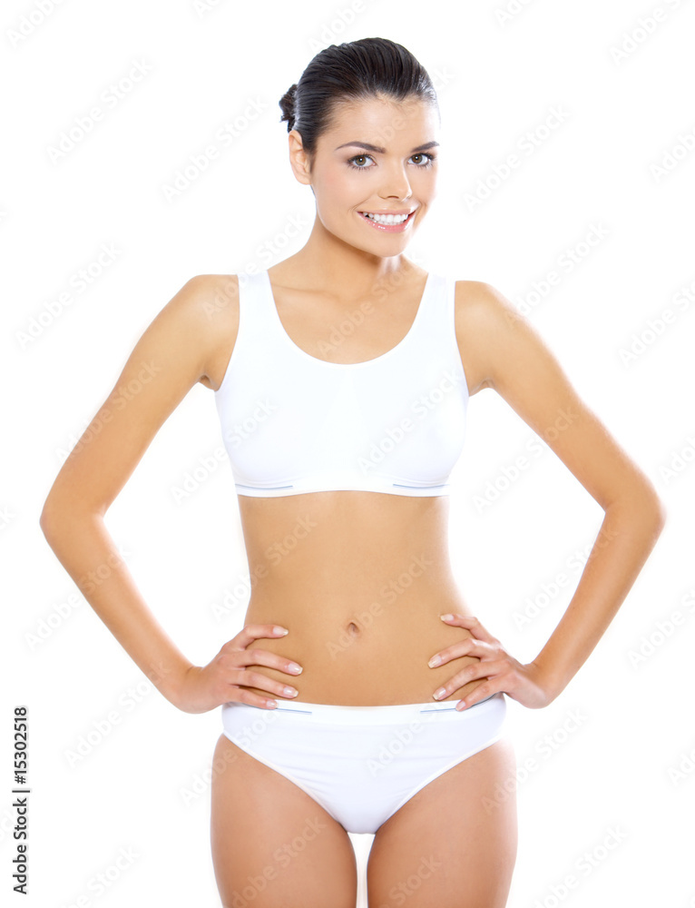 Young beautiful woman during fitness time and exercising Young beautiful woman during fitness time and exercising