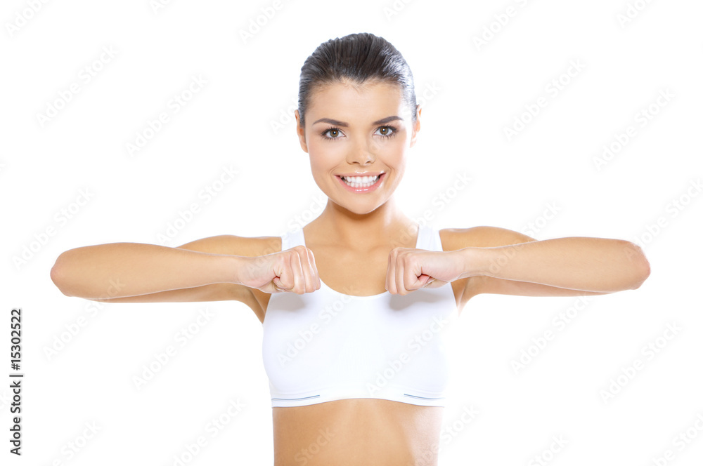 Young beautiful woman during fitness time and exercising Young beautiful woman during fitness time and exercising