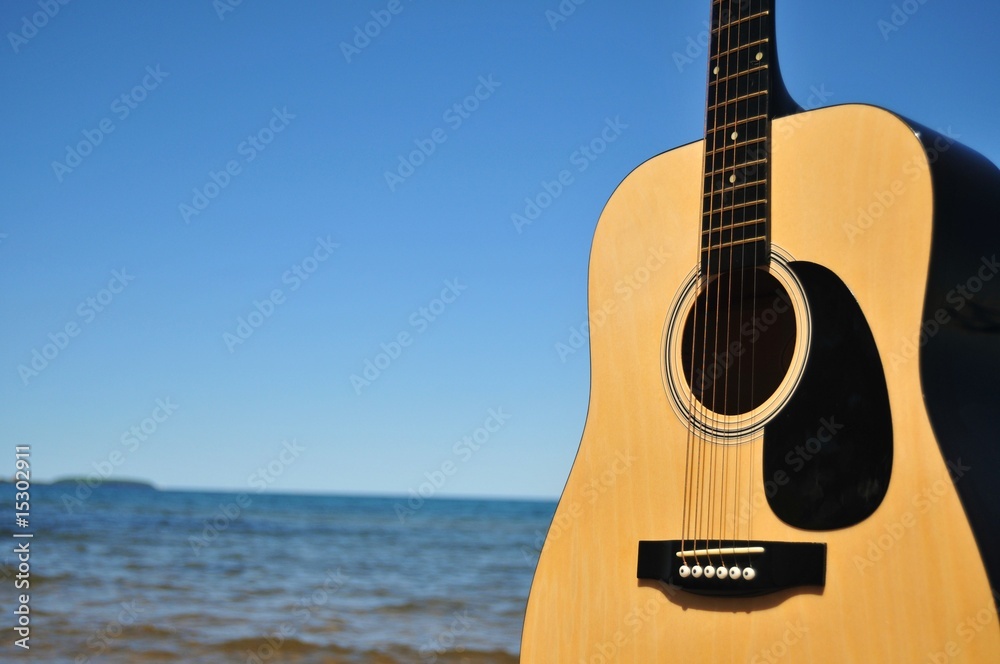 Fototapeta Guitar Facing The Beach