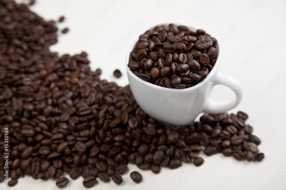 Cup with beans coffee on white Cup with beans coffee on white