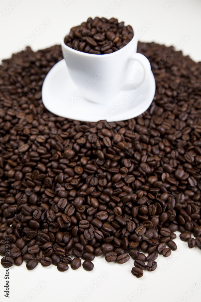 Cup with beans coffee on white Cup with beans coffee on white