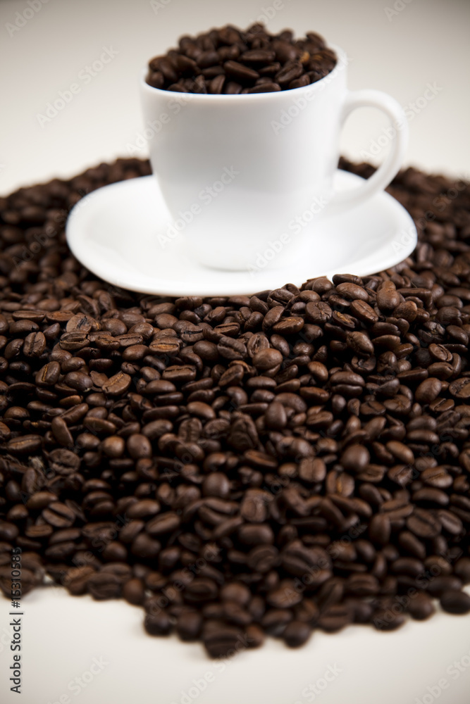 Cup with beans coffee on white Cup with beans coffee on white